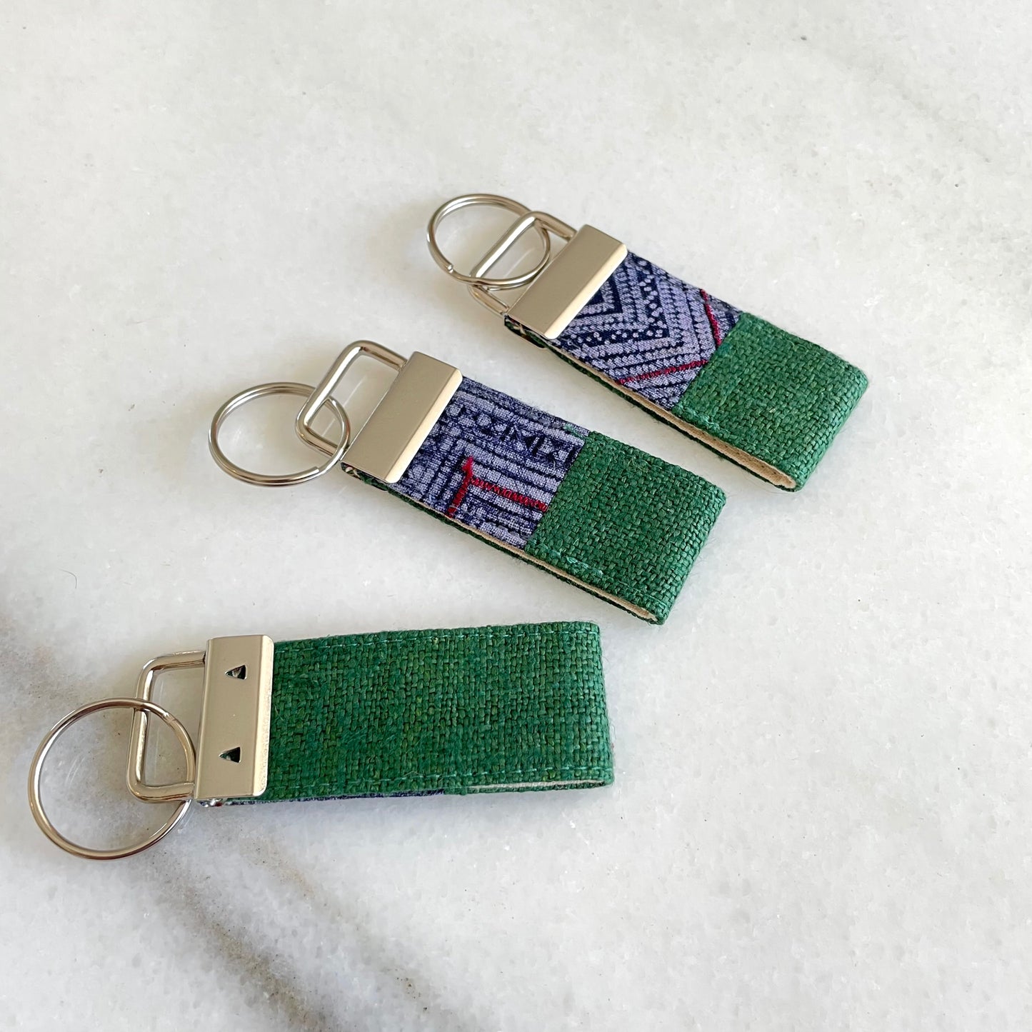 Classic green hemp fabric keychain with vintage batik patch, stainless metal key fob