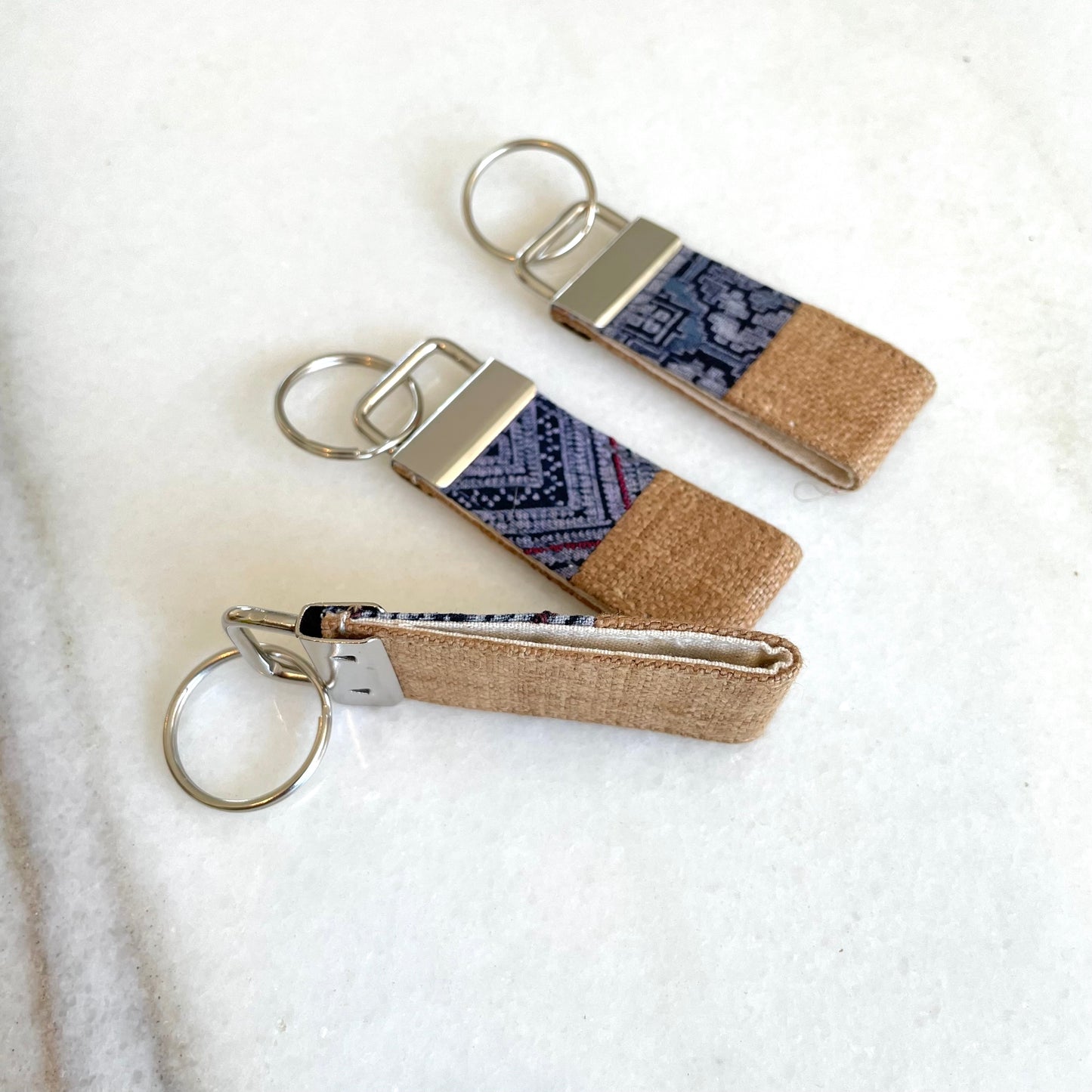 Brown hemp fabric keychain with vintage batik patch, stainless metal key fob