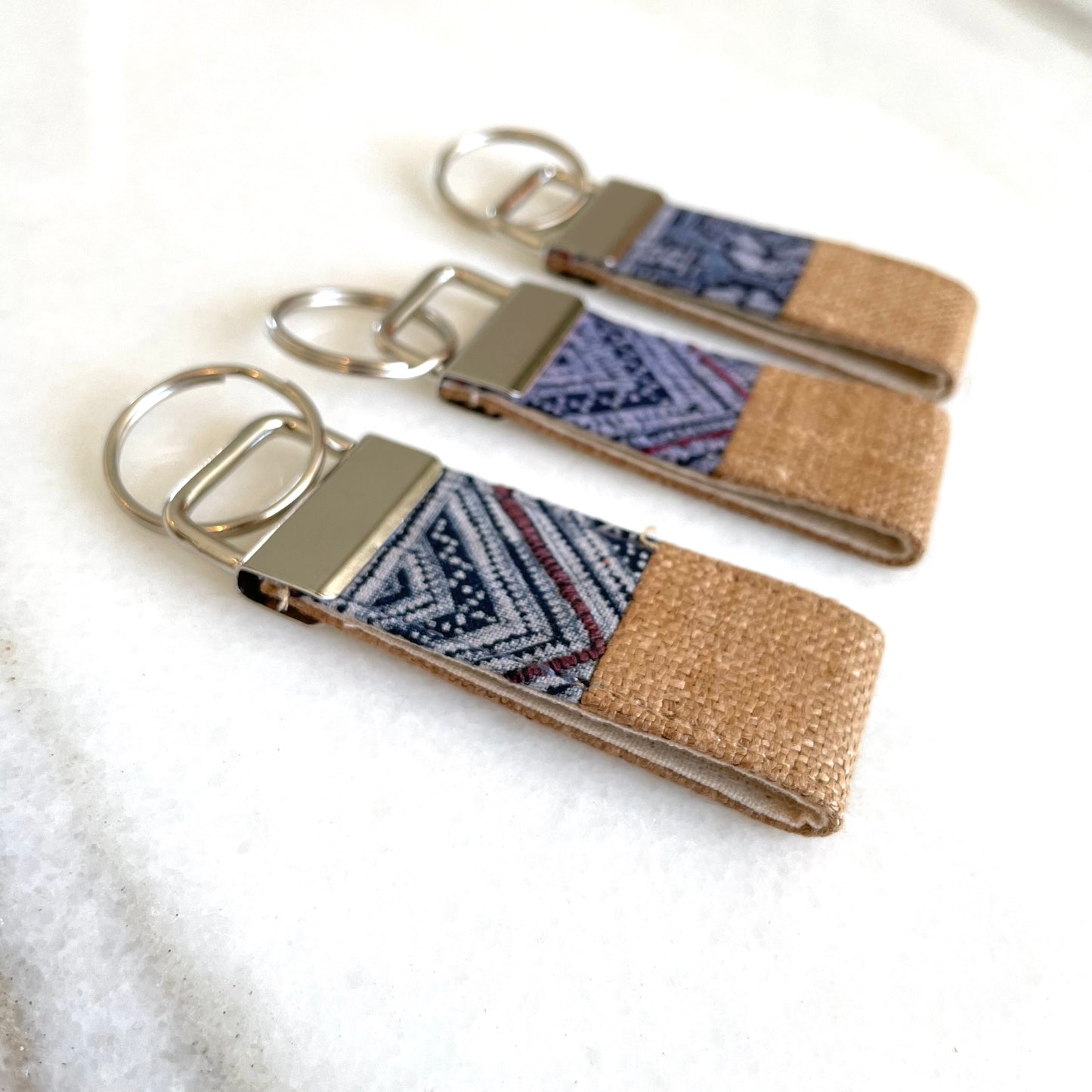 Brown hemp fabric keychain with vintage batik patch, stainless metal key fob