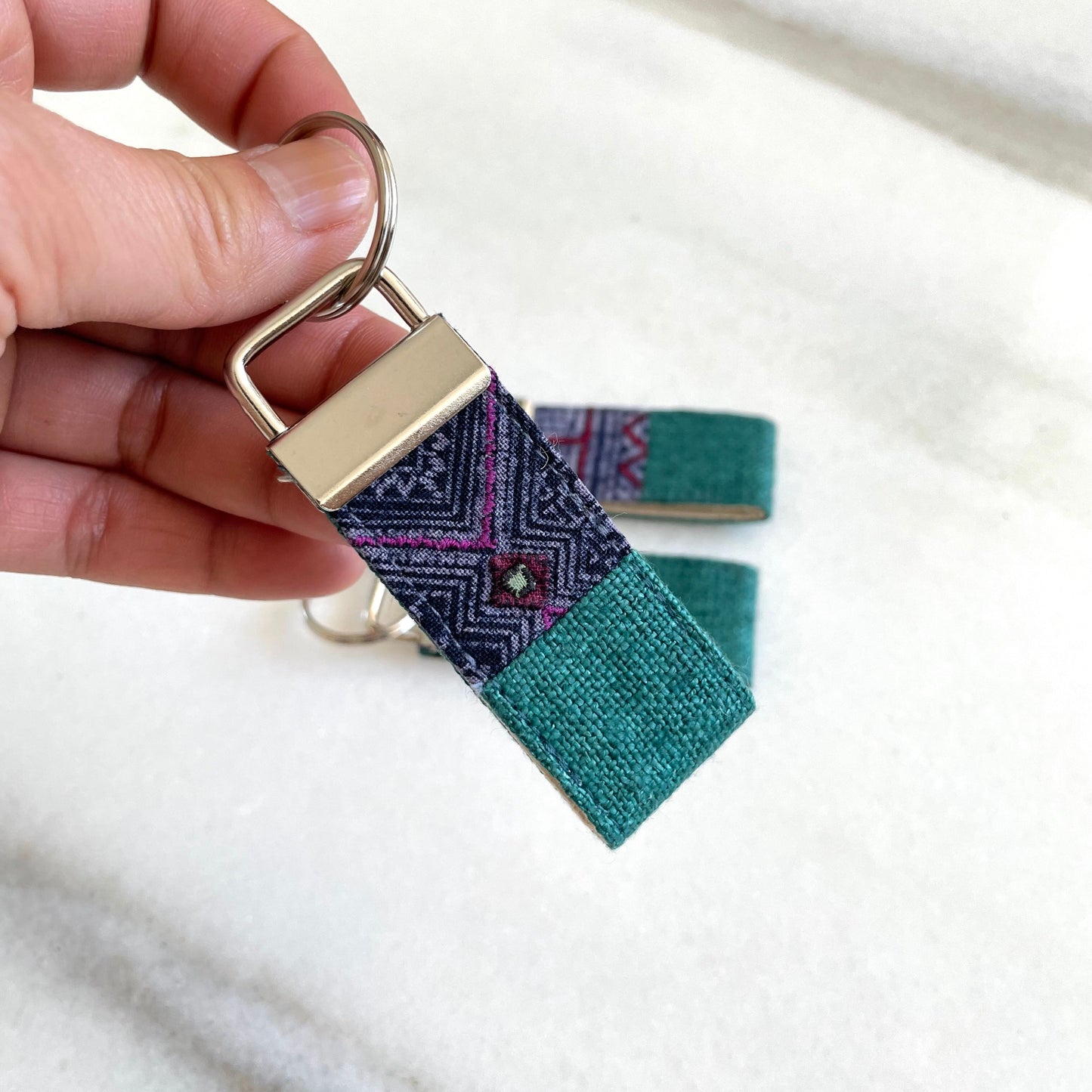 Emerald green hemp fabric keychain with vintage batik patch, stainless metal key fob