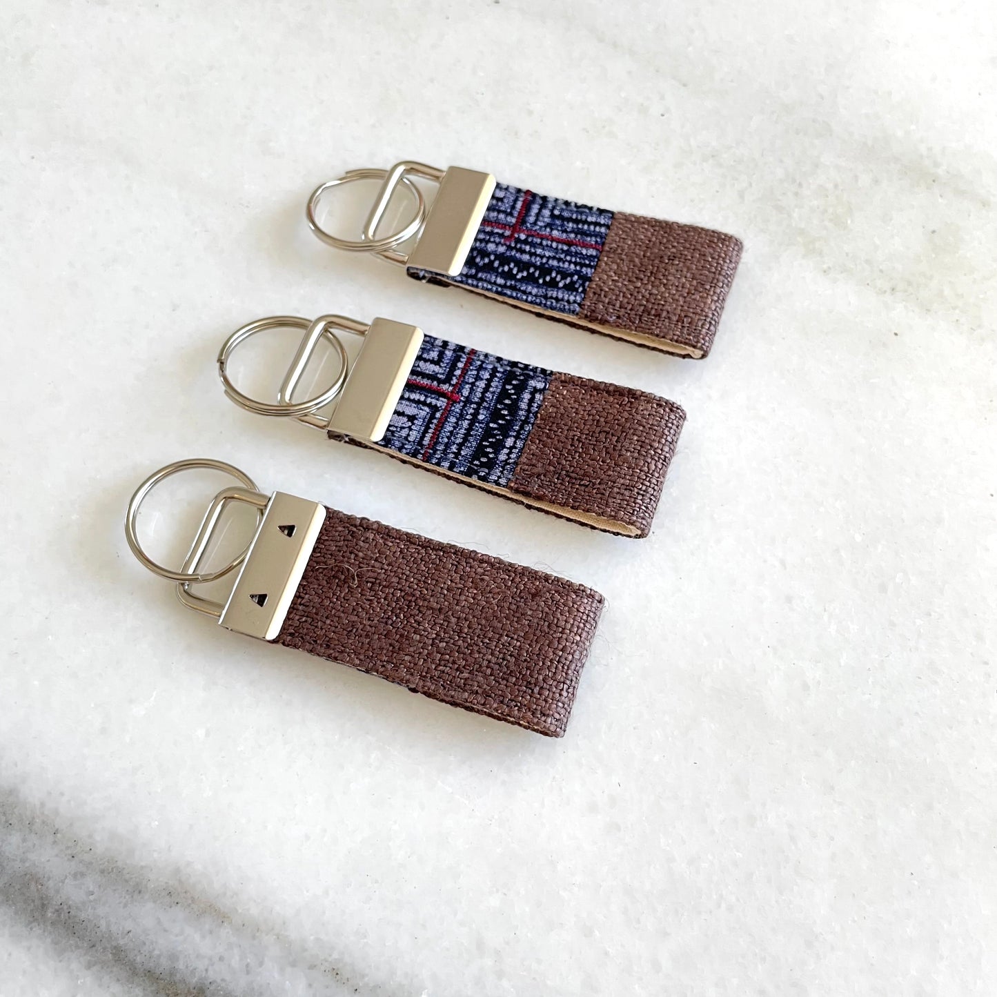 Dark brown hemp fabric keychain with vintage batik patch, stainless metal key fob