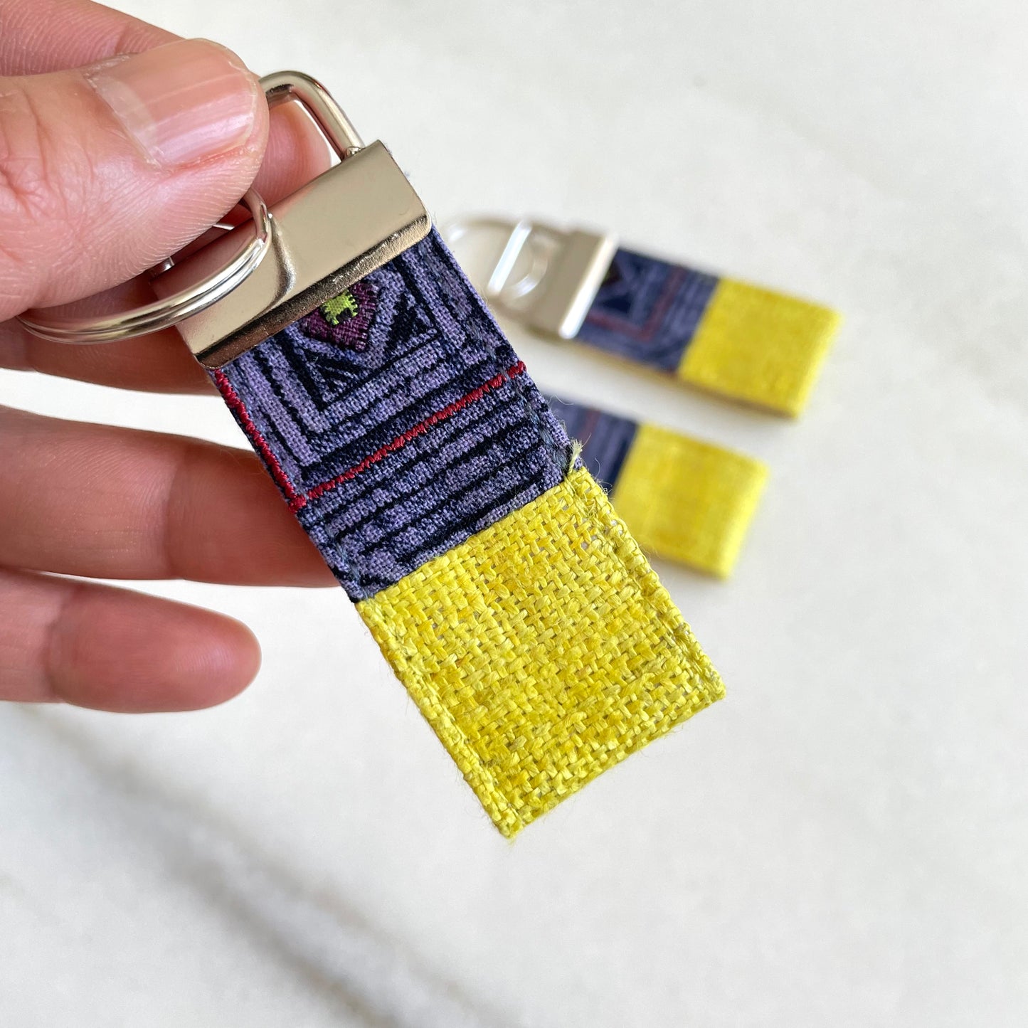 Bright yellow hemp fabric keychain with vintage batik patch, stainless metal key fob