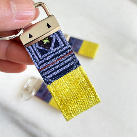 Bright yellow hemp fabric keychain with vintage batik patch, stainless metal key fob