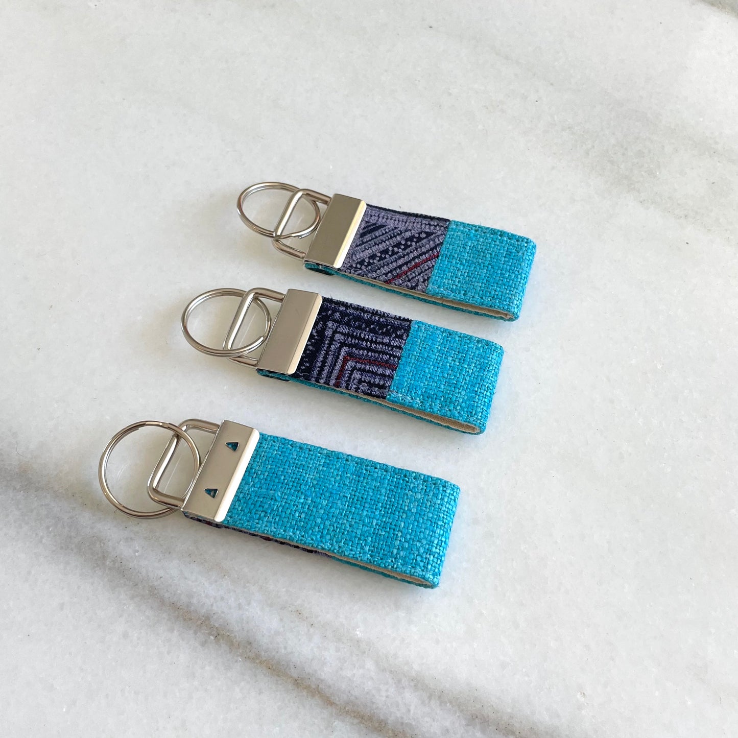 Turquoise blue hemp fabric keychain with vintage batik patch, stainless metal key fob