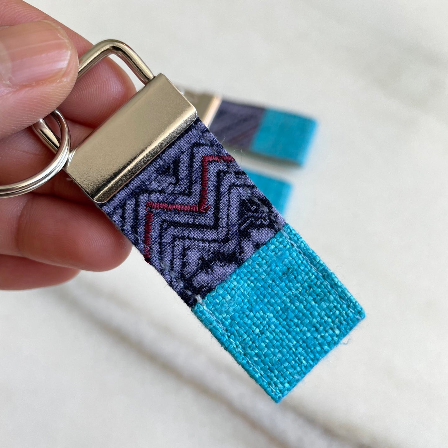 Turquoise blue hemp fabric keychain with vintage batik patch, stainless metal key fob