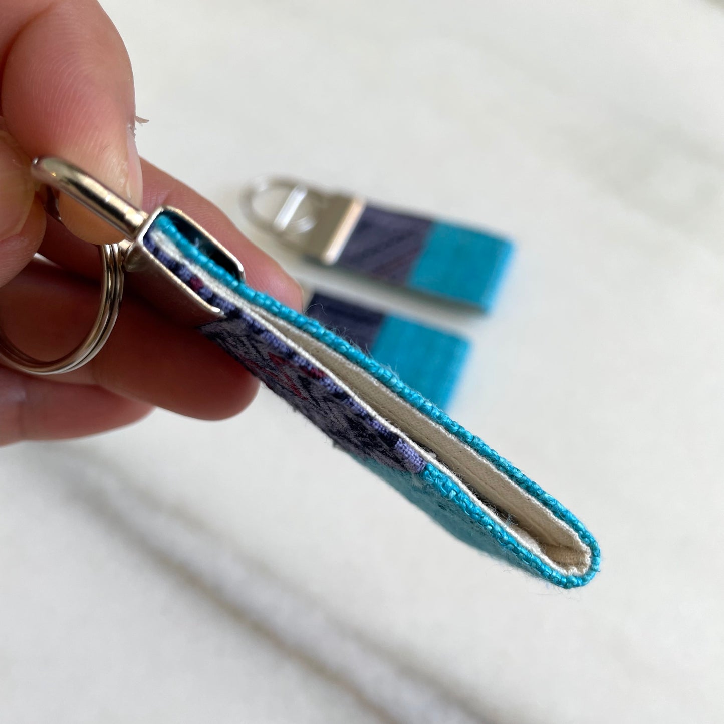 Turquoise blue hemp fabric keychain with vintage batik patch, stainless metal key fob