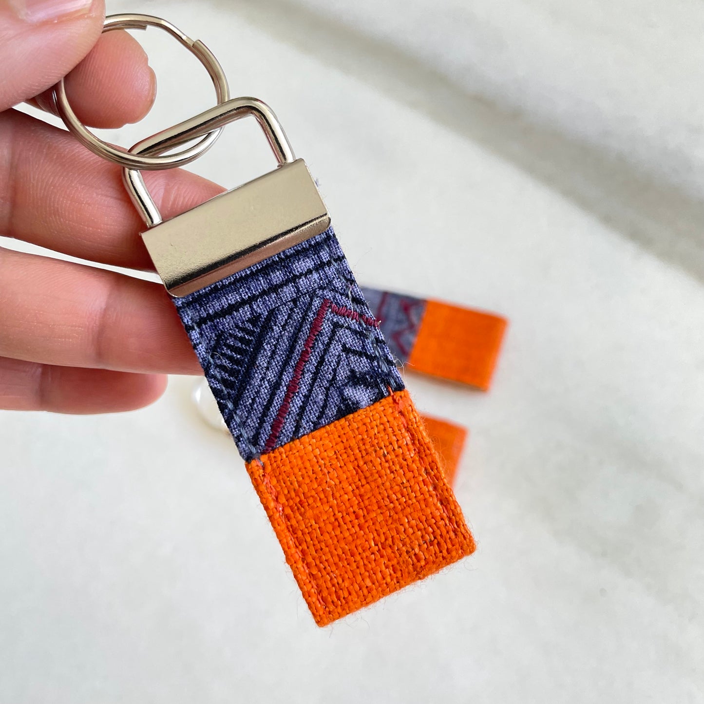 Orange hemp fabric keychain with vintage batik patch, stainless metal key fob