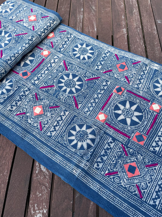Block print batik with embroidery and appliqué on cotton in Sun pattern