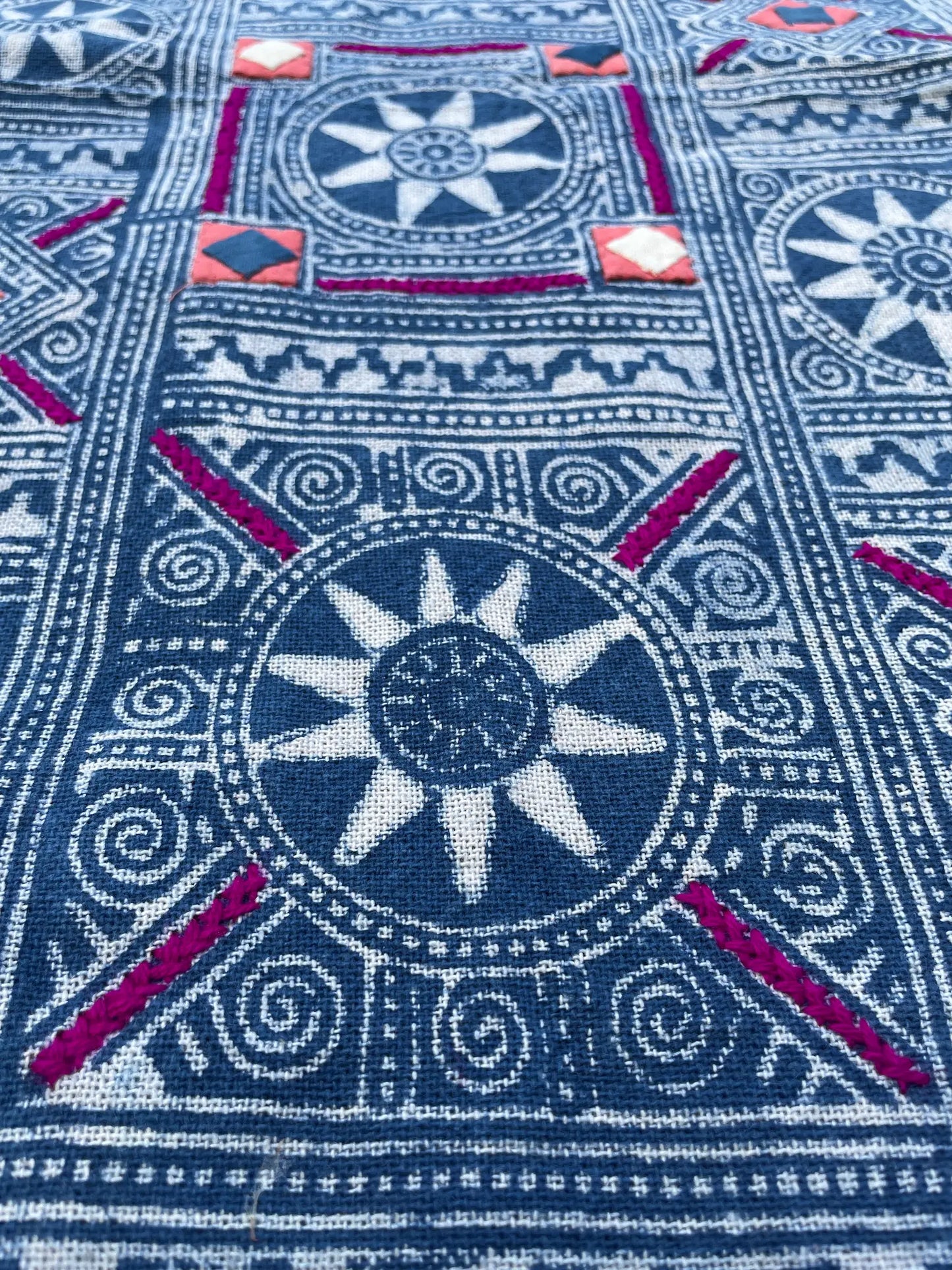 Block print batik with embroidery and appliqué on cotton in Sun pattern
