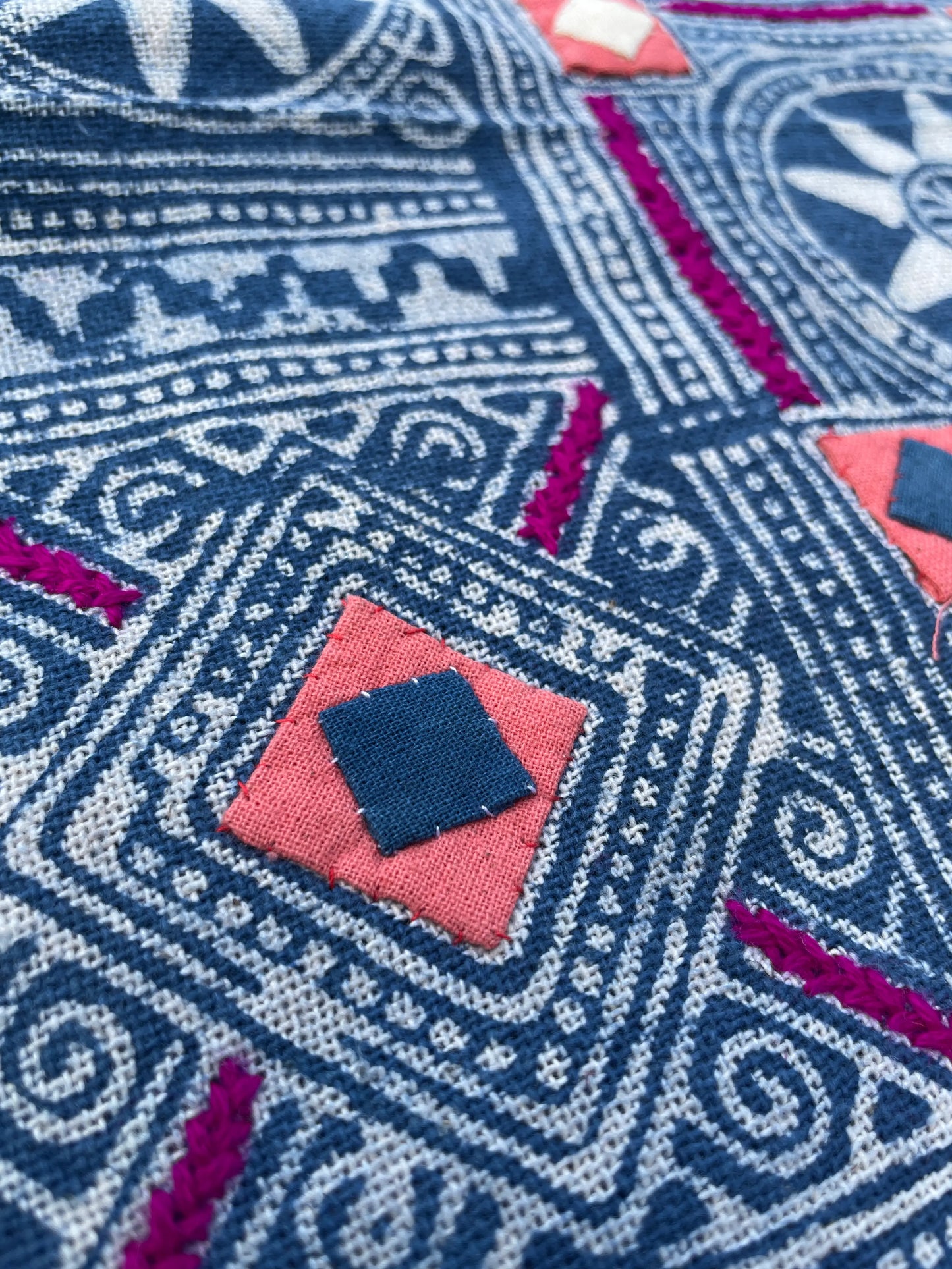 Block print batik with embroidery and appliqué on cotton in Sun pattern