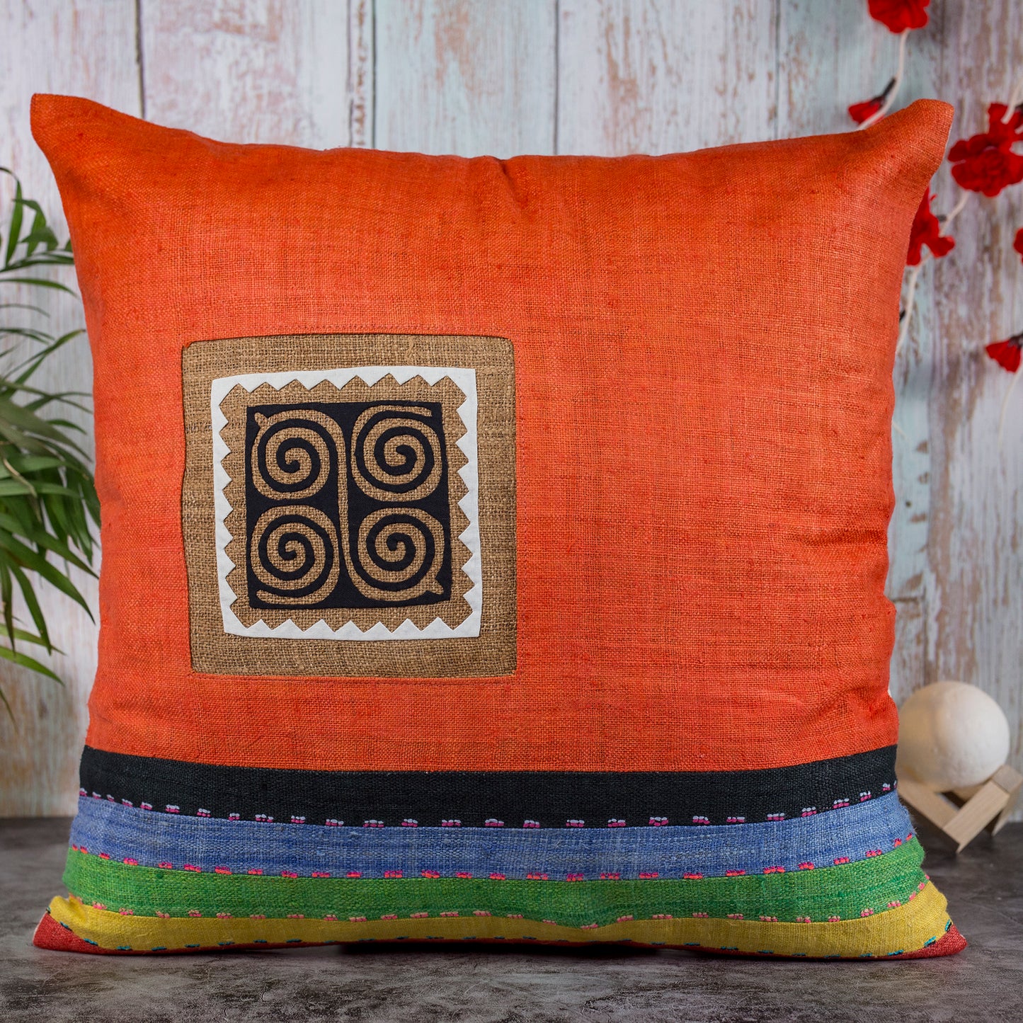 Orange Hemp Cushion Cover with stripes in different colors, hand-stitched pattern in black and brown