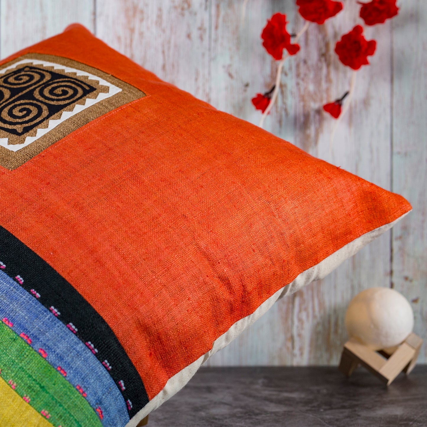 Orange Hemp Cushion Cover with stripes in different colors, hand-stitched pattern in black and brown