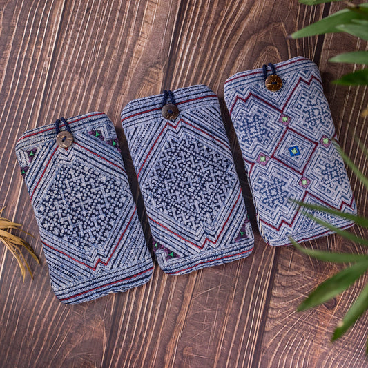 Phone case / glass case, repurposed H'mong batik fabric, shock absorption layer