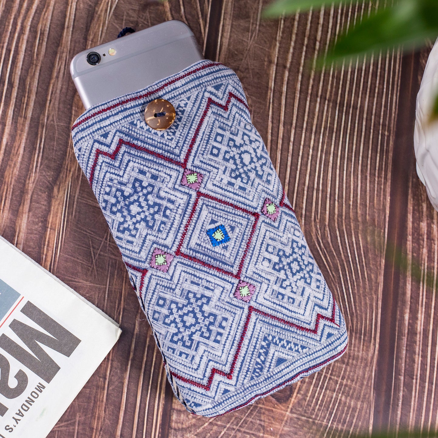 Phone case / glass case, repurposed H'mong batik fabric, shock absorption layer