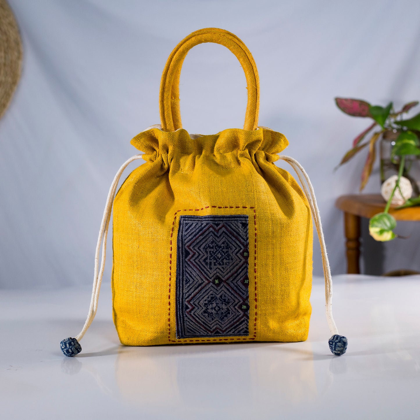 Yellow drawstring hemp handbag, natural hemp and batik patch