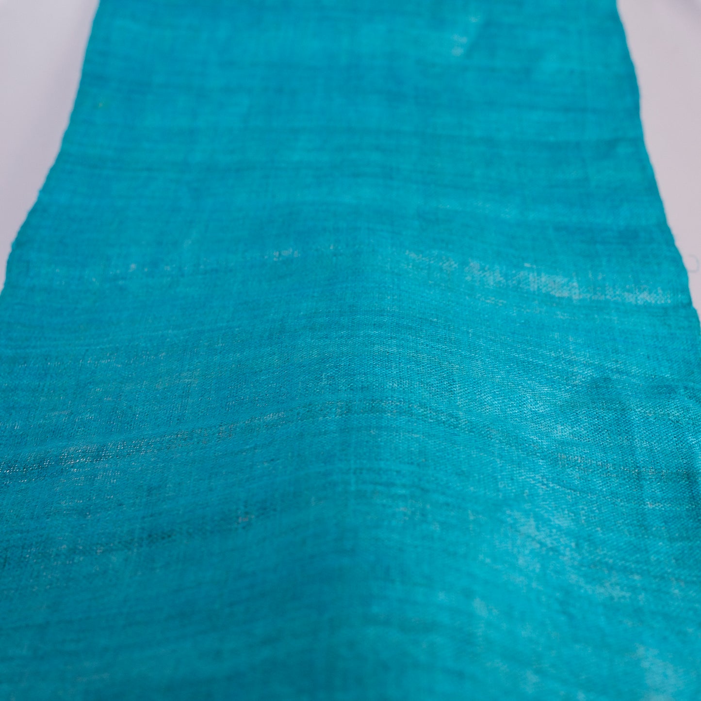 Raw hemp fabric, natural color in TURQUOISE BLUE