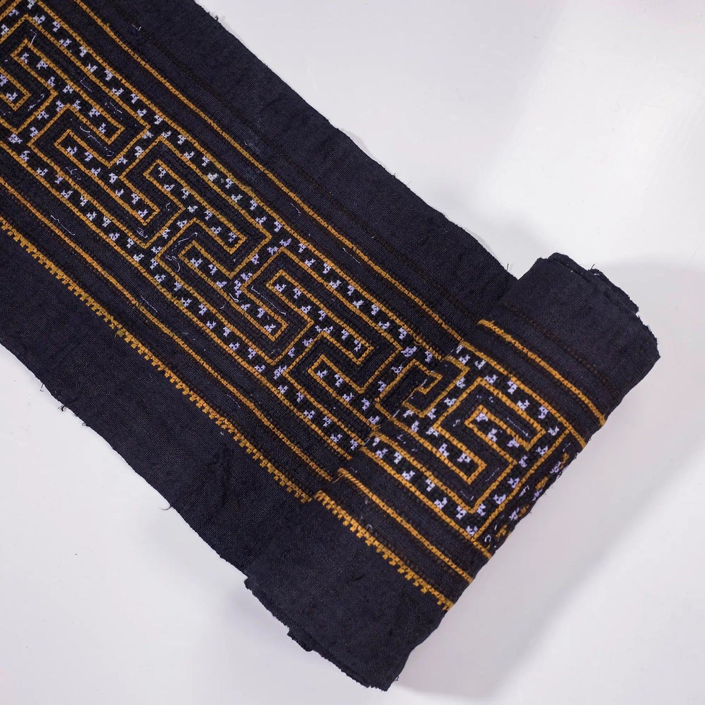Vintage cross-stitch embroidery roll, labyrinth pattern