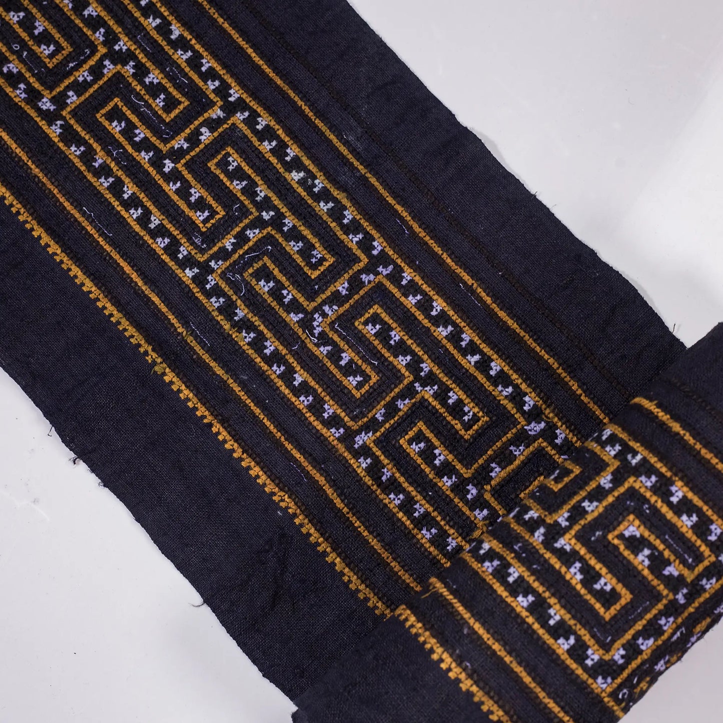 Vintage cross-stitch embroidery roll, labyrinth pattern