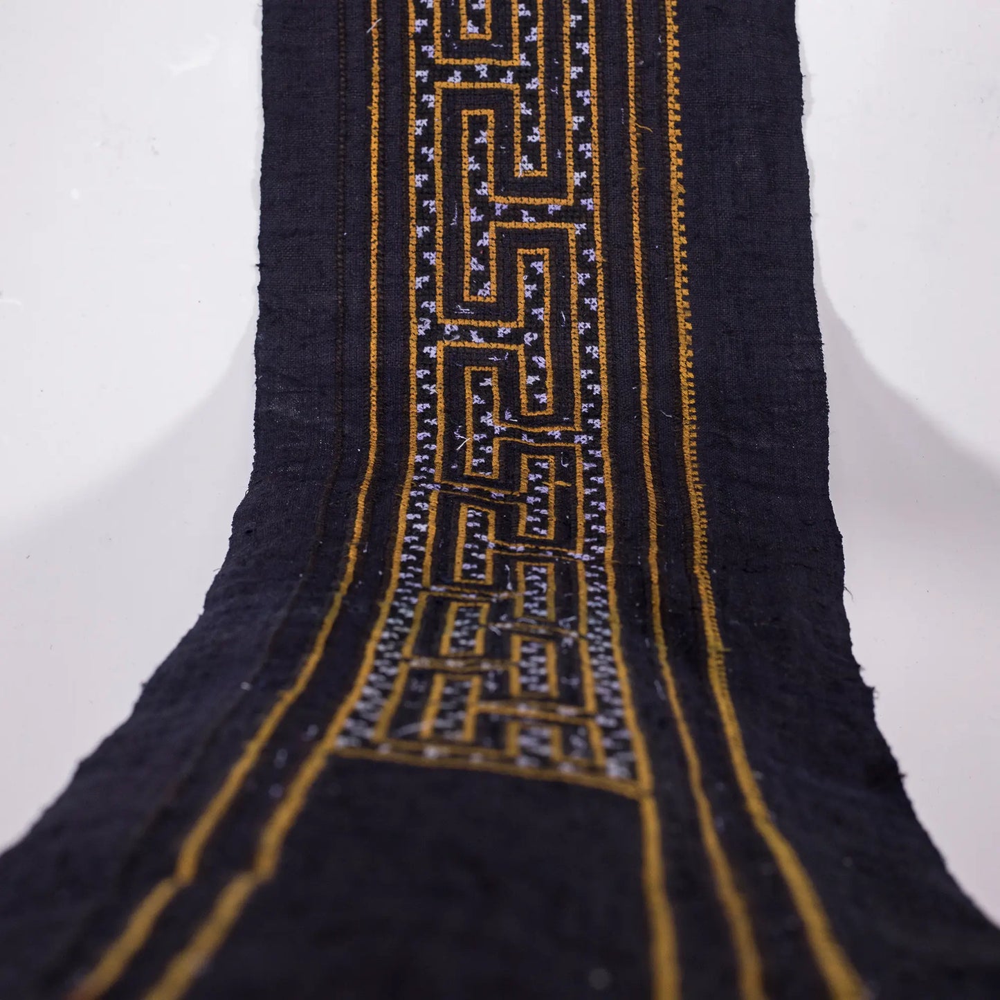 Vintage cross-stitch embroidery roll, labyrinth pattern