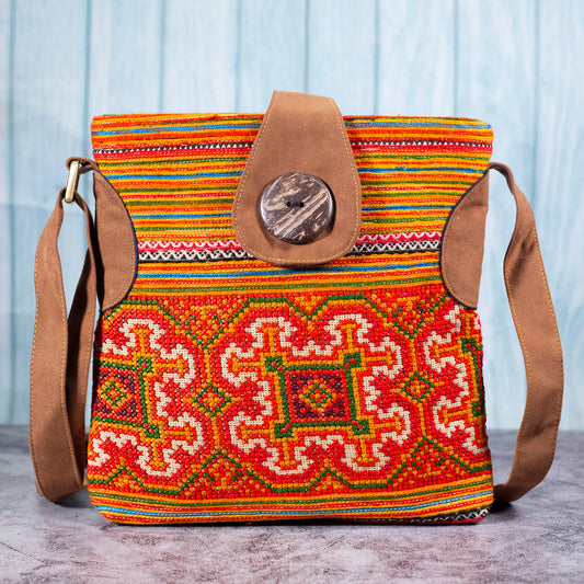 Flowery pattern, Orange embroidery cross-body bag, faux leather straps, coconut button