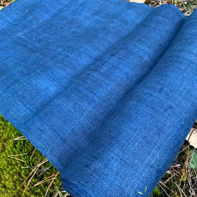 Close-up of indigo hemp fabric on a natural background