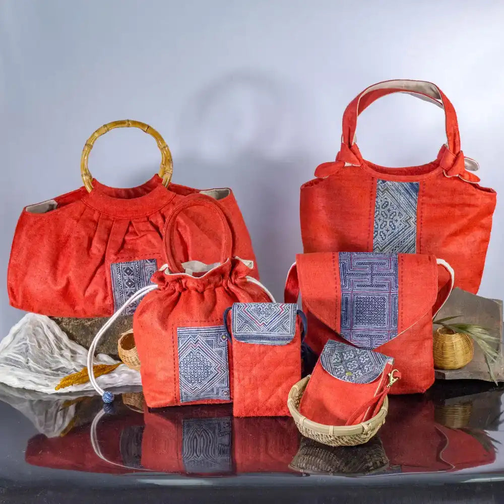 Set of red hemp flip phone belt bags (mobilväskor) with vintage H’Mong patches