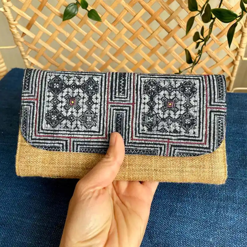 Vindigo long purse beige black embroidered front view hand holding