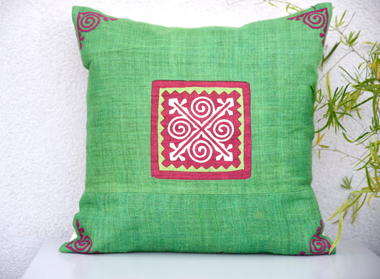 Green Cushion Cover (45x45 cm), embroidered corners, white patch on pink background