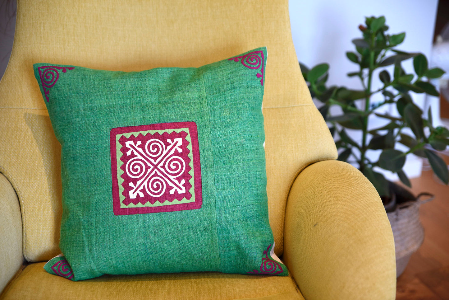 Green Cushion Cover (45x45 cm), embroidered corners, white patch on pink background