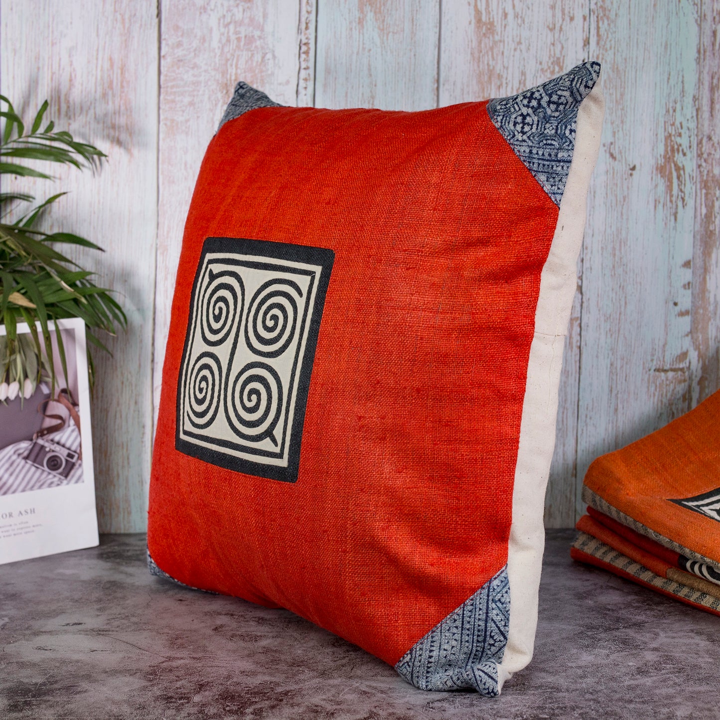 Red Hemp Cushion Cover, beeswax batik at corner, red hand-embroidered patch