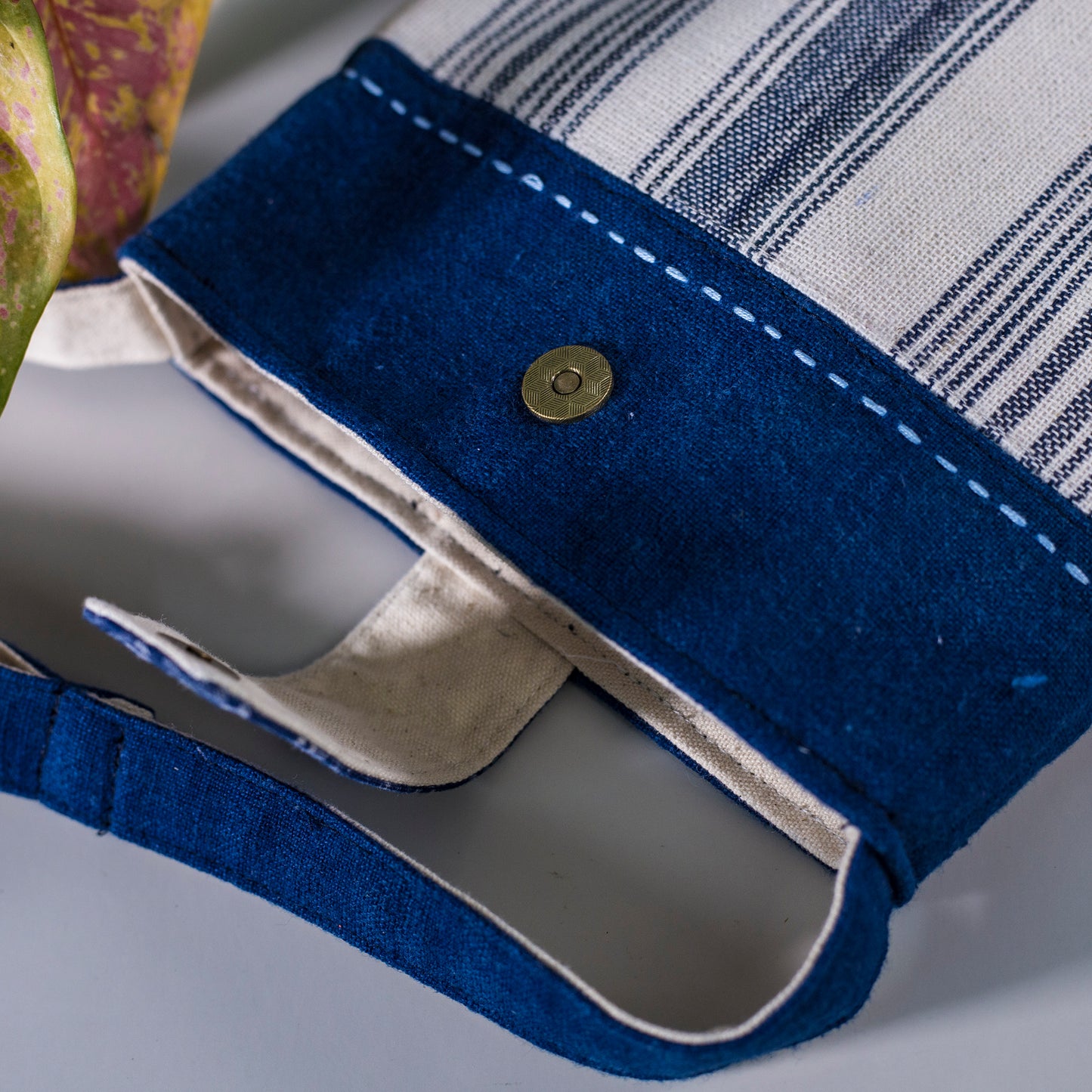 Handwoven crossbody bag from natural hemp in indigo blue