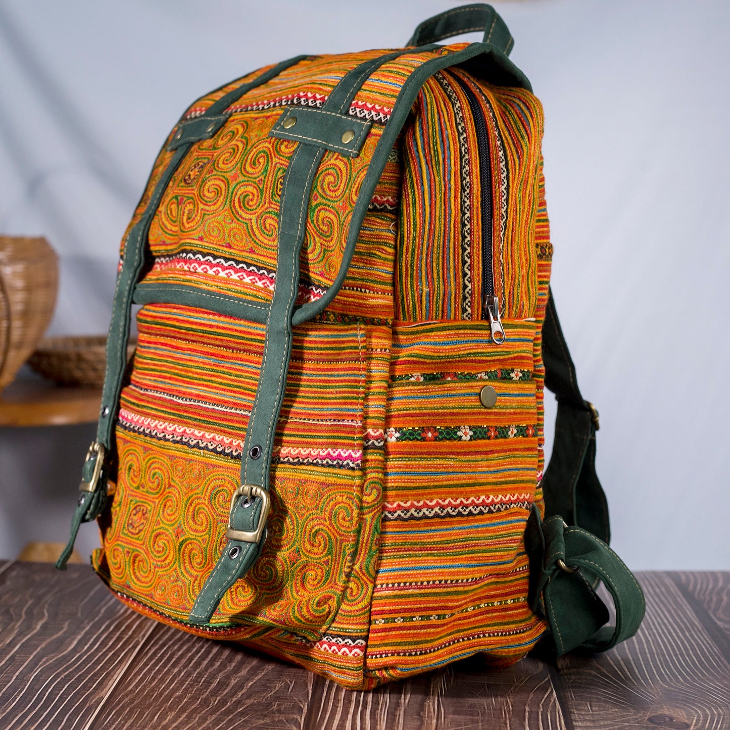 Big-sized backpack, orange hand-embroidery fabric, faux leather trim, moss green color