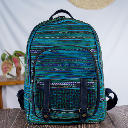 Big-sized backpack, round pocket in front, blue hand-embroidery fabric, black faux leather trim