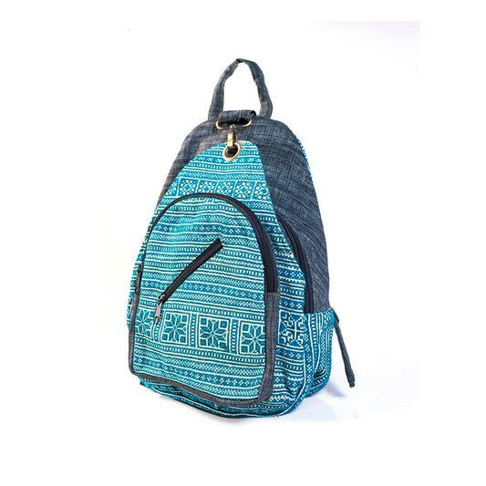 Multi-purpose backpack and sling, light blue hand-embroidery fabric, dark blue trim