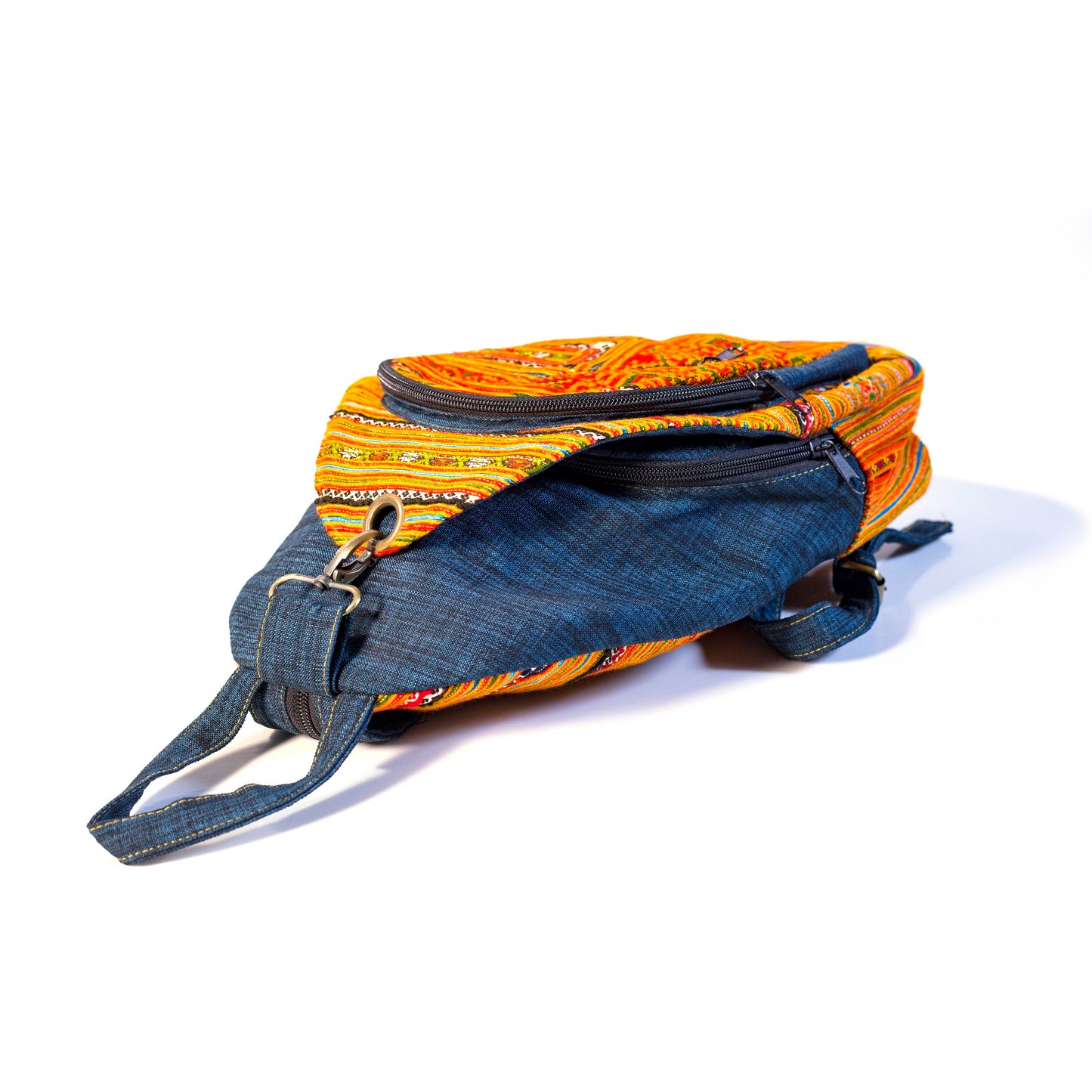 Multi-purpose backpack and sling, orange blue hand-embroidery fabric, dark blue trim