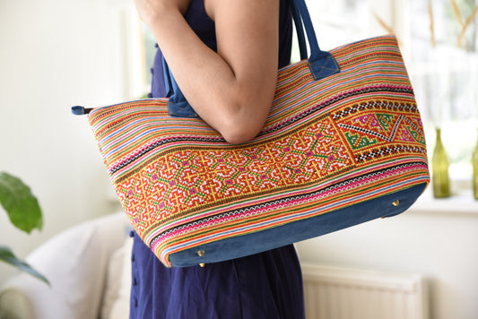 Orange rectangle form bag, hand-embroidered, tribal pattern