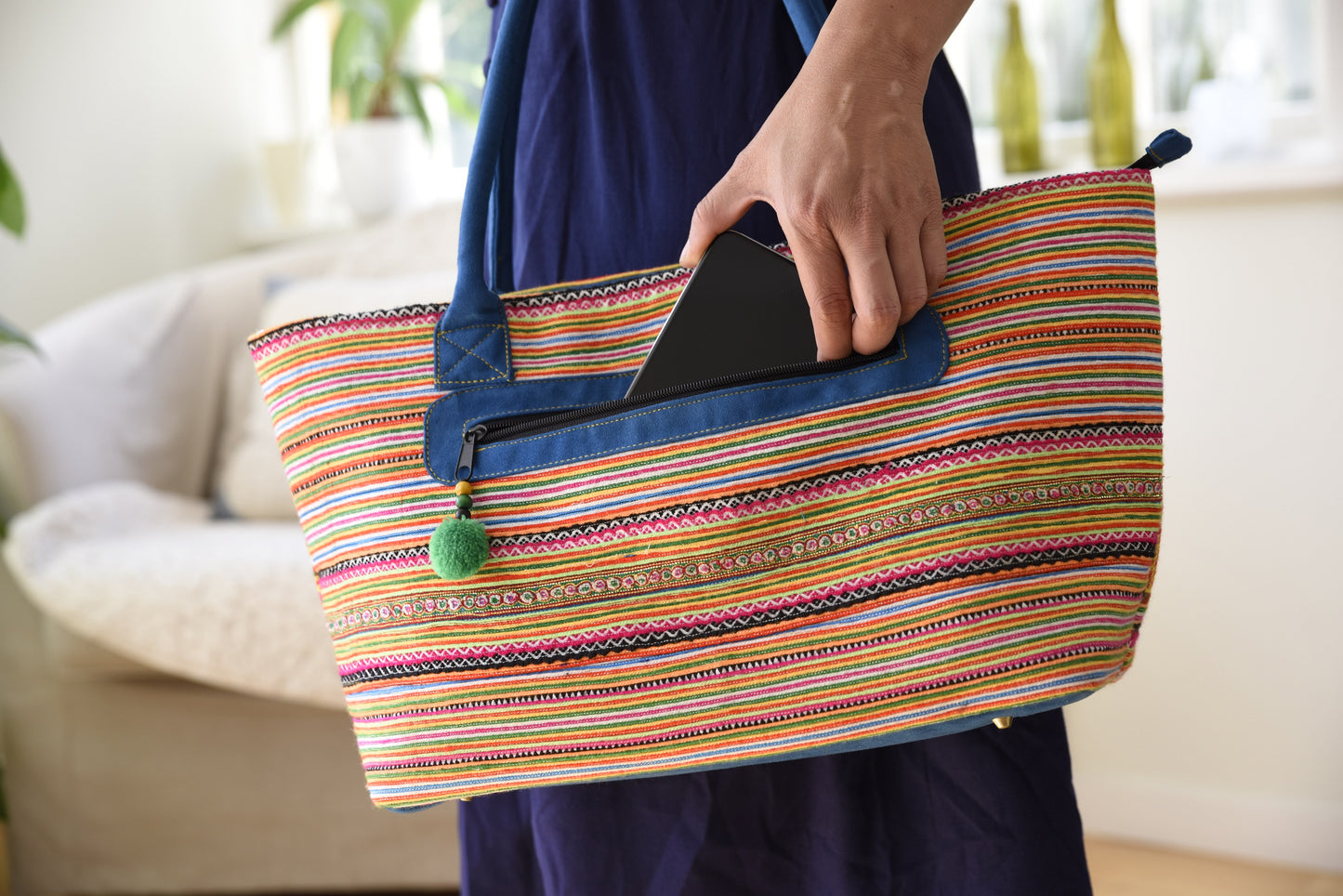 Orange rectangle form bag, hand-embroidered, tribal pattern