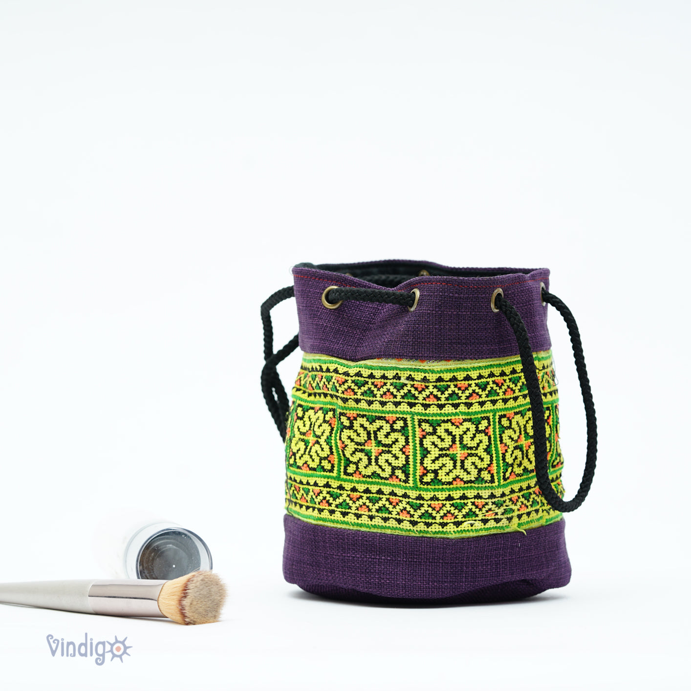 Purple mini hemp bag with string, green tribal pattern