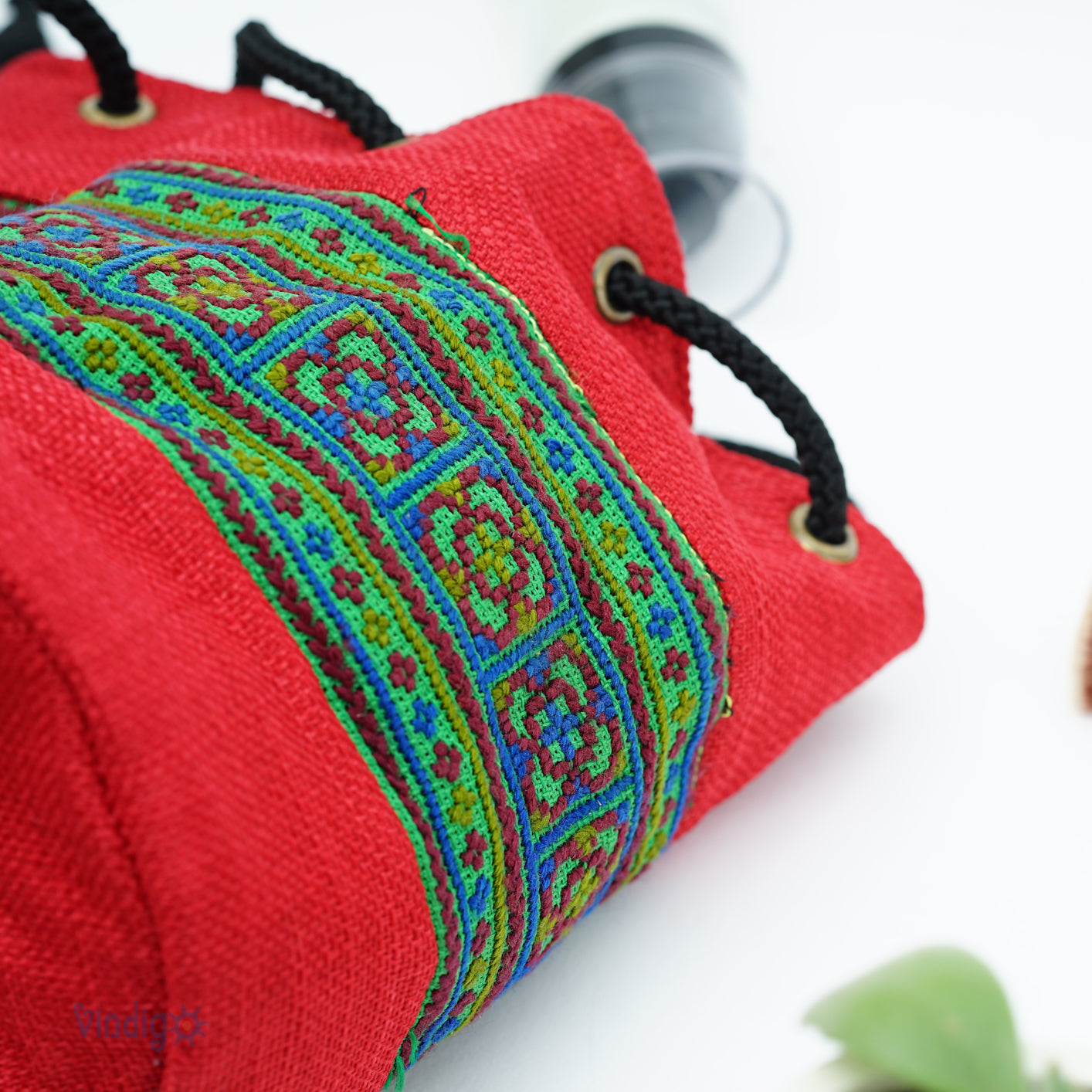 Red multi-purpose bag with string, Hemp, tribal pattern on green background