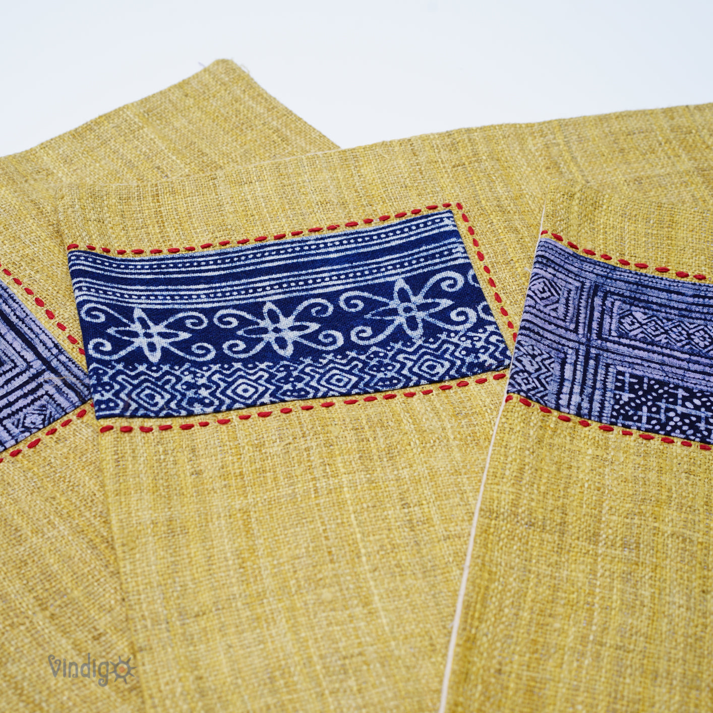 Yellow hemp placemat, hand-embroidered patch, hand stitches