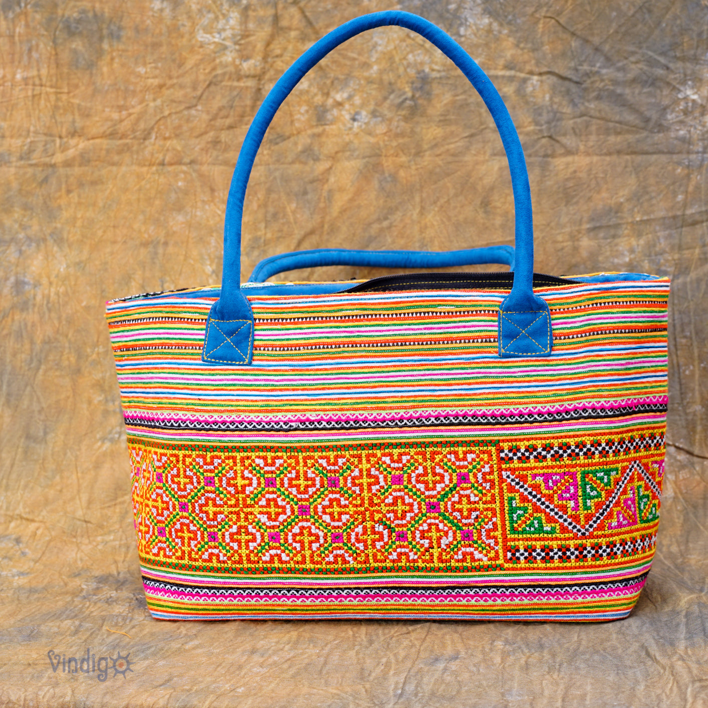 Orange rectangle form bag, hand-embroidered, tribal pattern